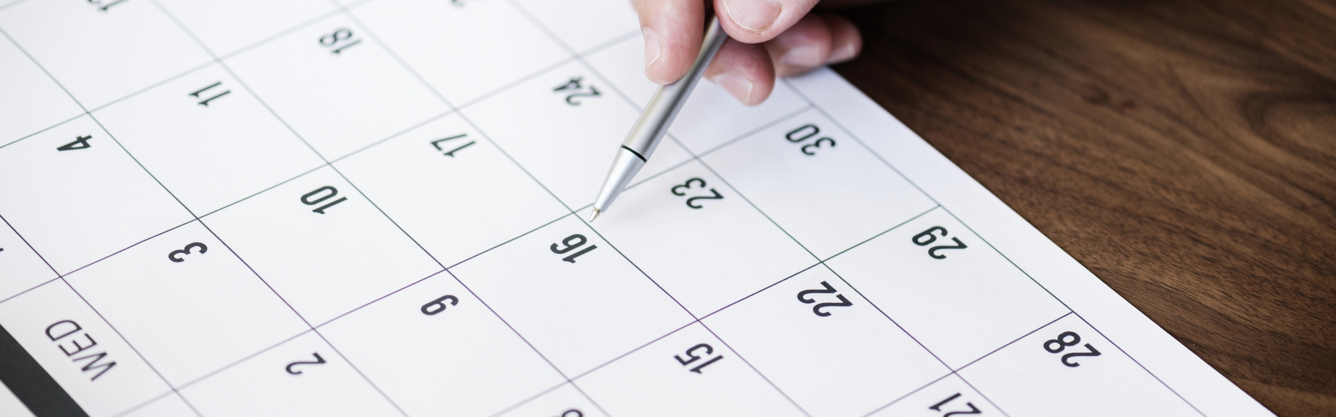 businessman marking calendar appointment